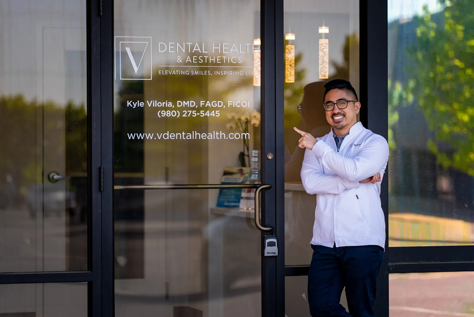 Dr. Viloria at the office entrance
